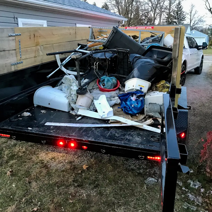 Roll-off dumpster delivered to a residential driveway in Genesee